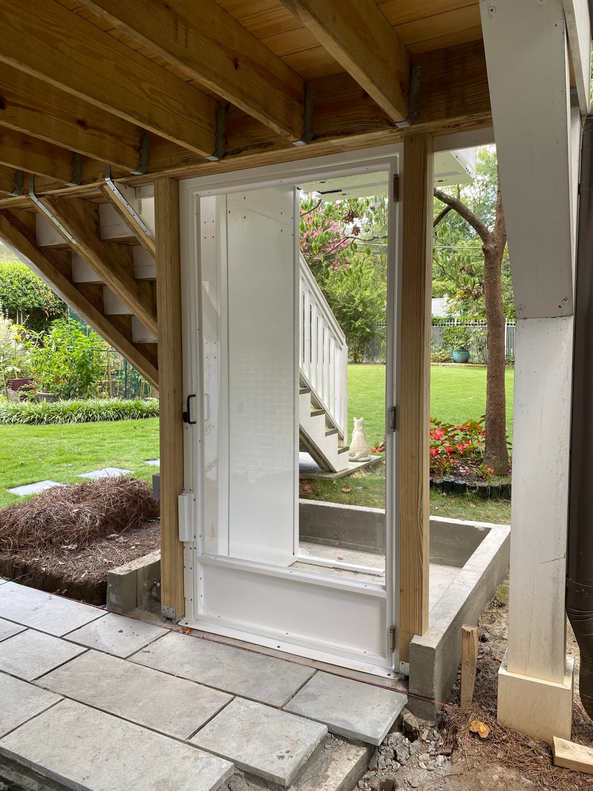 white unenclosed lift porch lift outdoor