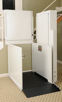 symmetry white residential lift in white on carpet floor