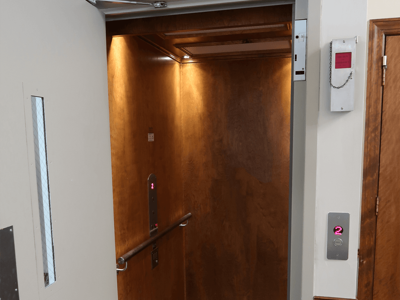 Hybrid Lift with Country Pine Stain on Birch flat panels and brushed stainless steel fixtures