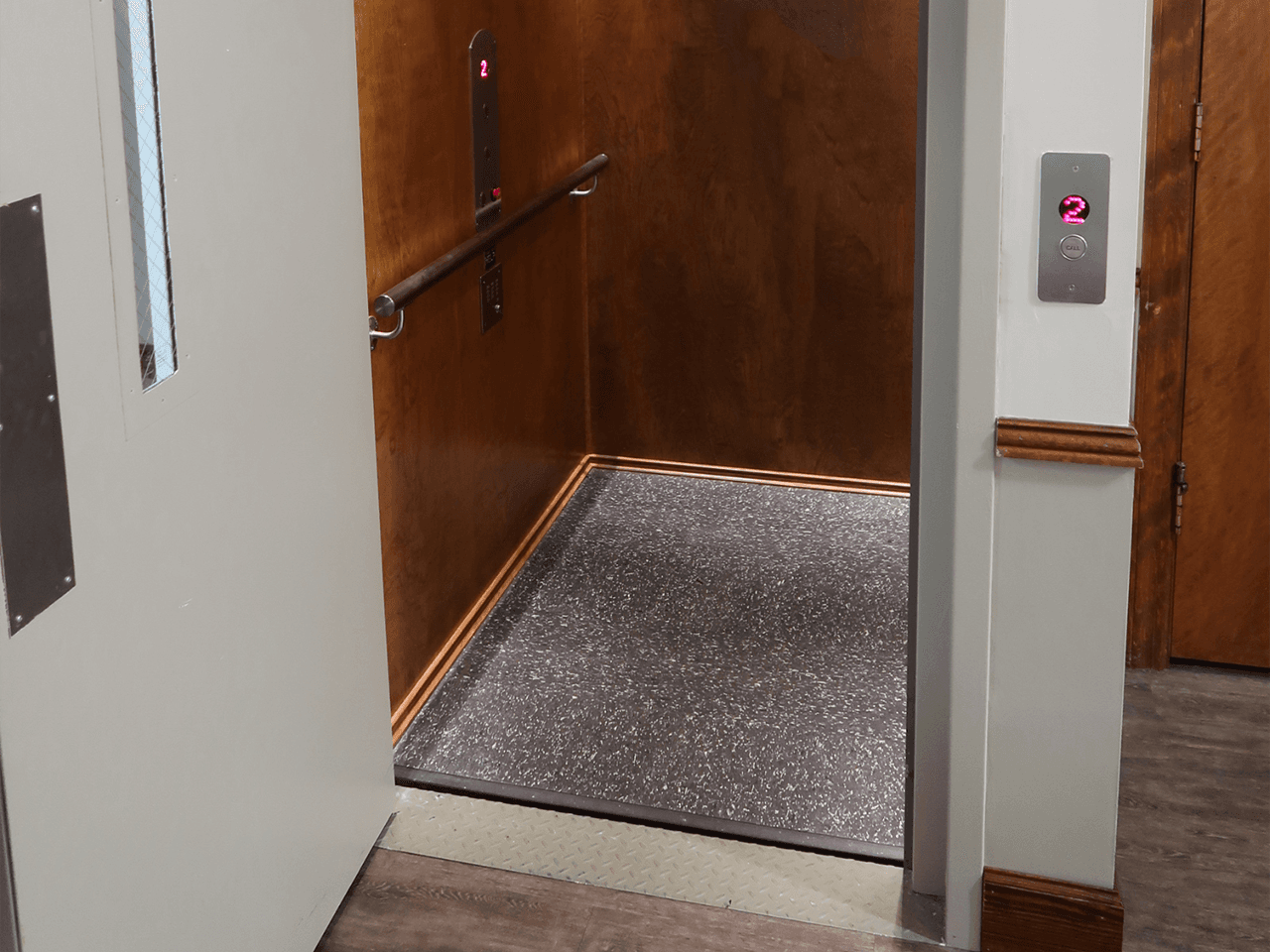 Hybrid Lift with Country Pine Stain on Birch flat panels and brushed stainless steel fixtures