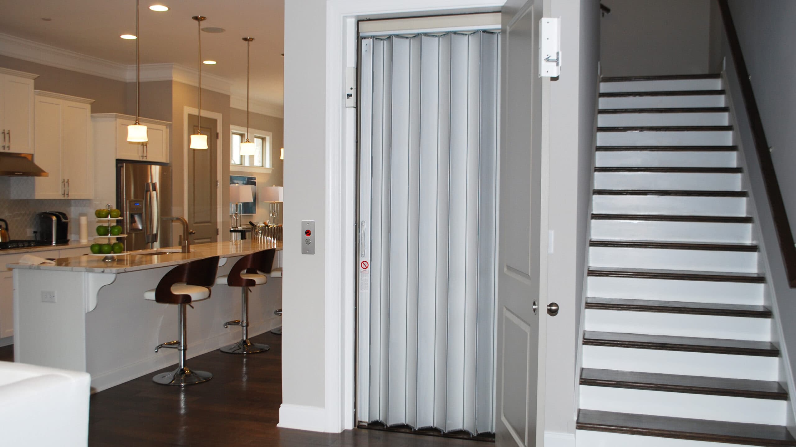 symmetry home elevator gallery accordion gate