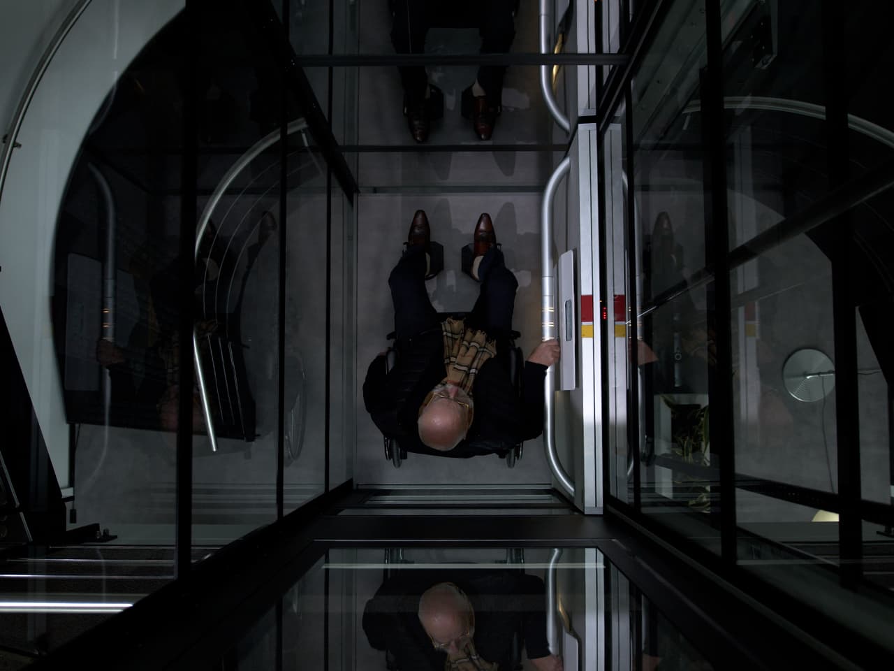 Veteran using a Cibes Symmetry elevator for home accessibility