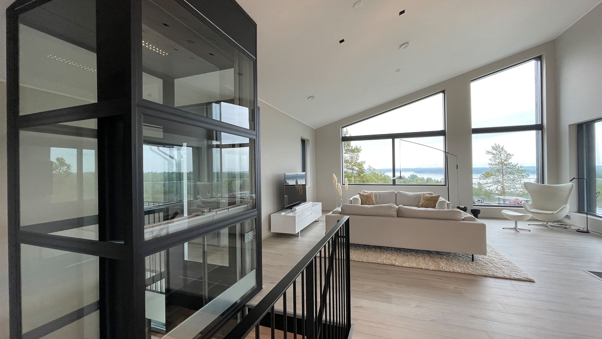 retrofit residential elevator installed between floors in an existing home