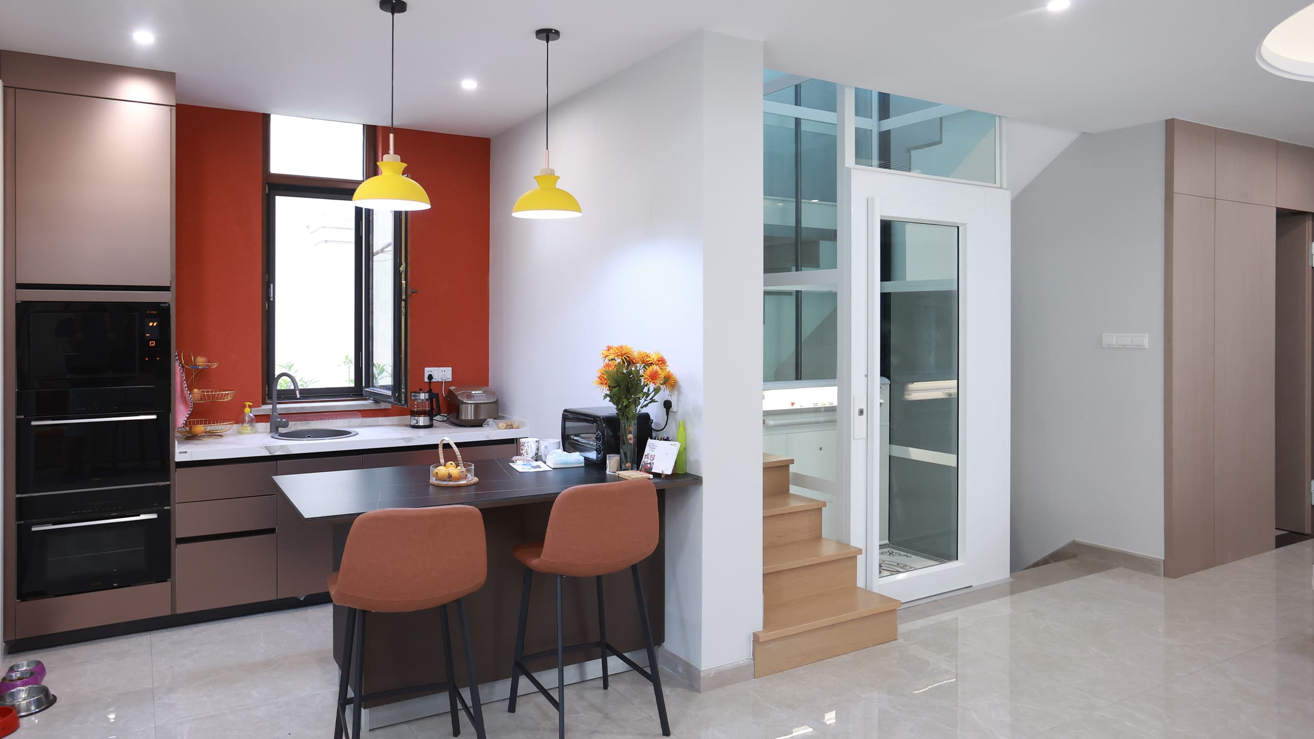 compact home lift installed in a small residential floor plan