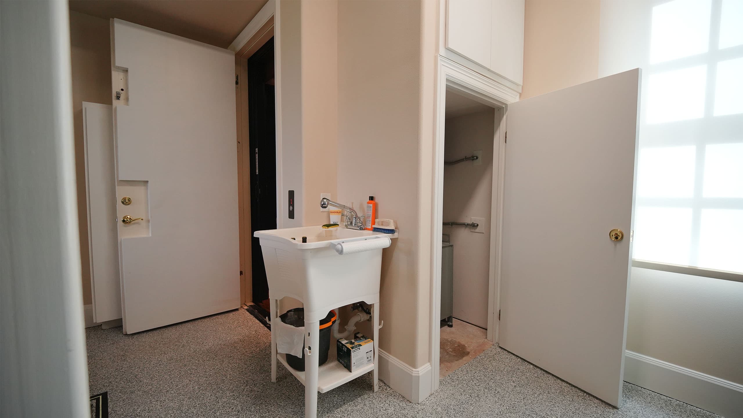 homeowner planning a residential elevator installation